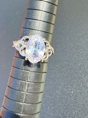 Silver Floral Halo Ring with Oval Clear Stone